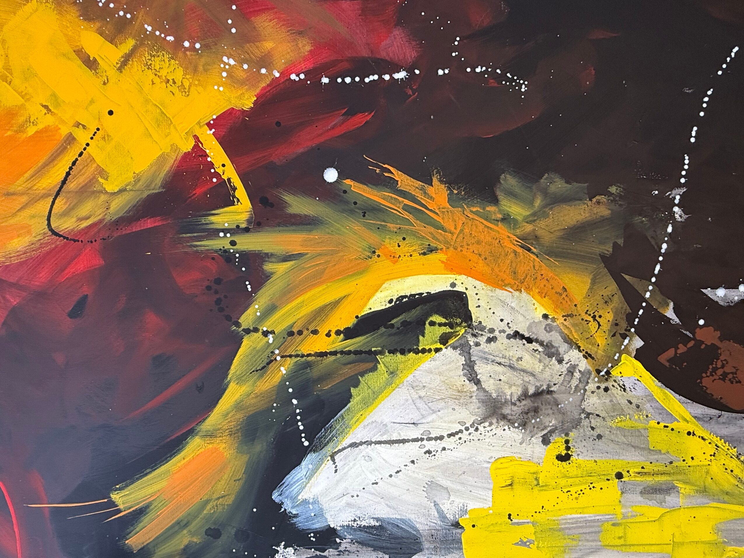 Abstract painting with bold yellow, red, black, and white brushstrokes and splashes.