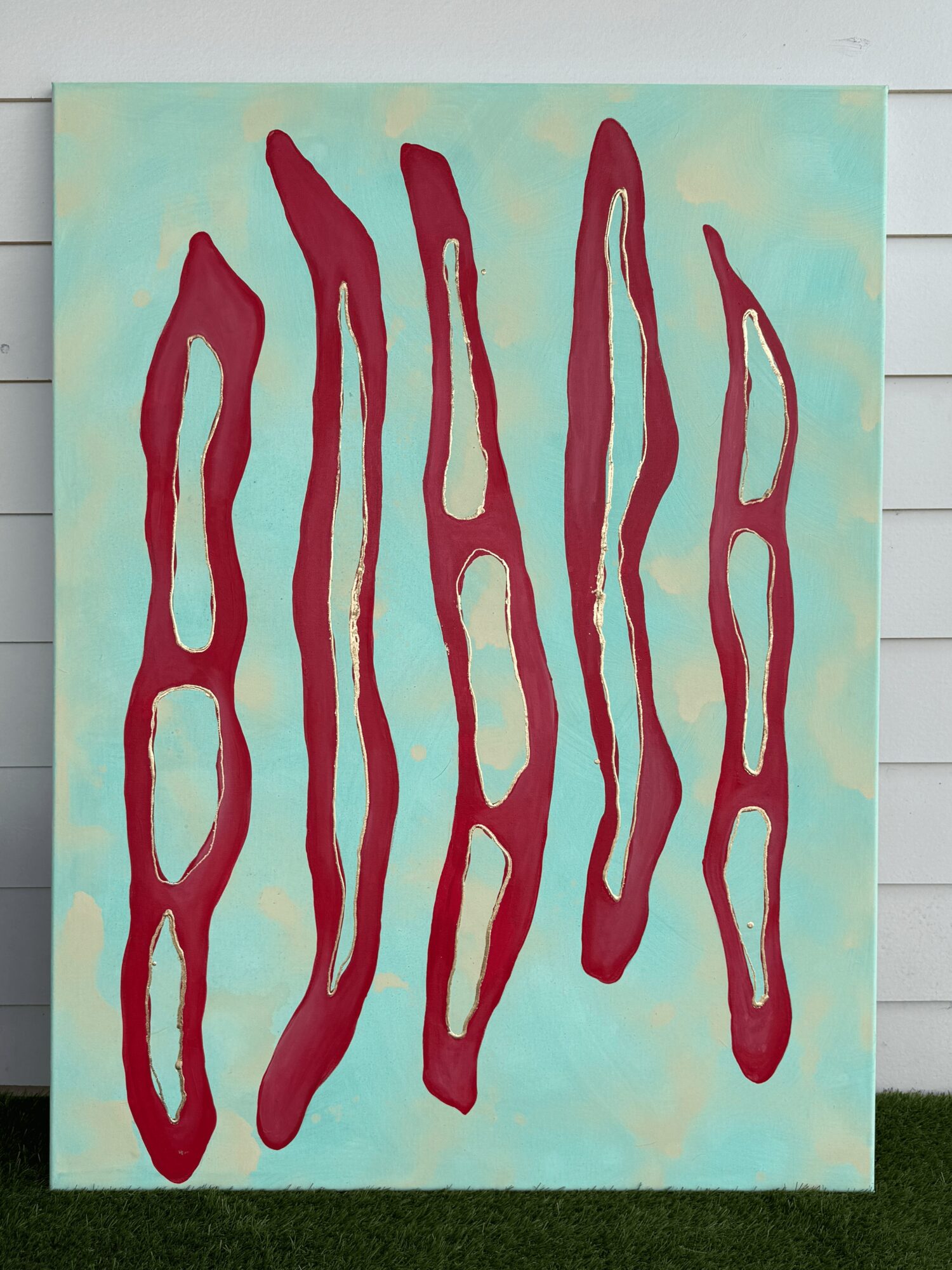 Abstract artwork with red elongated shapes on a light blue background.