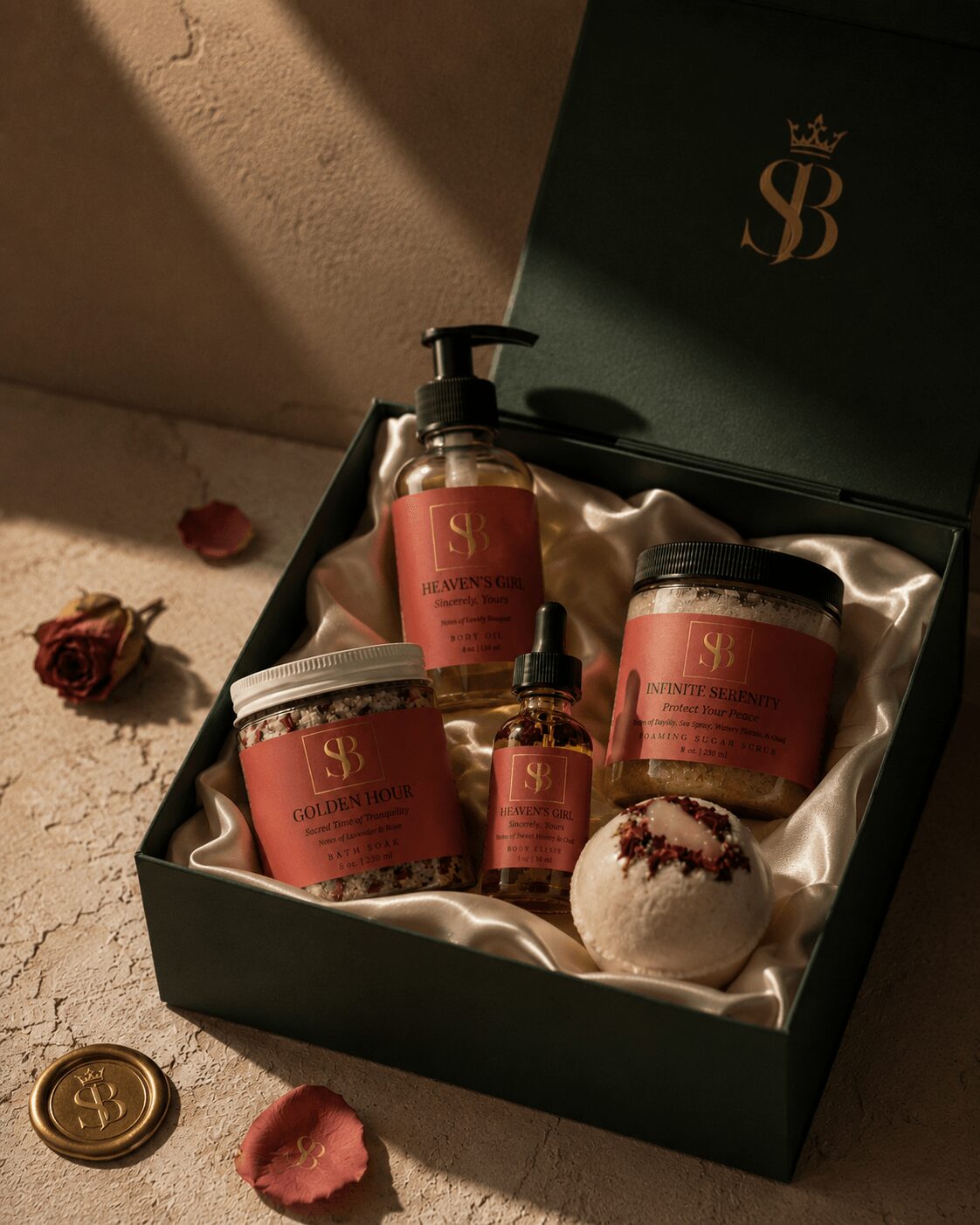 Open black box with skincare products and a decorative ball, lined with satin, on a textured surface with dried roses.