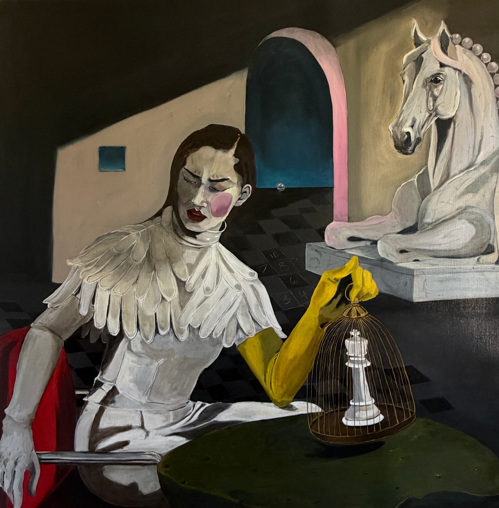A woman with makeup and feathered clothing sits at a table with a yellow glove, holding a glass dome over a chess piece, with a white horse statue in the background.